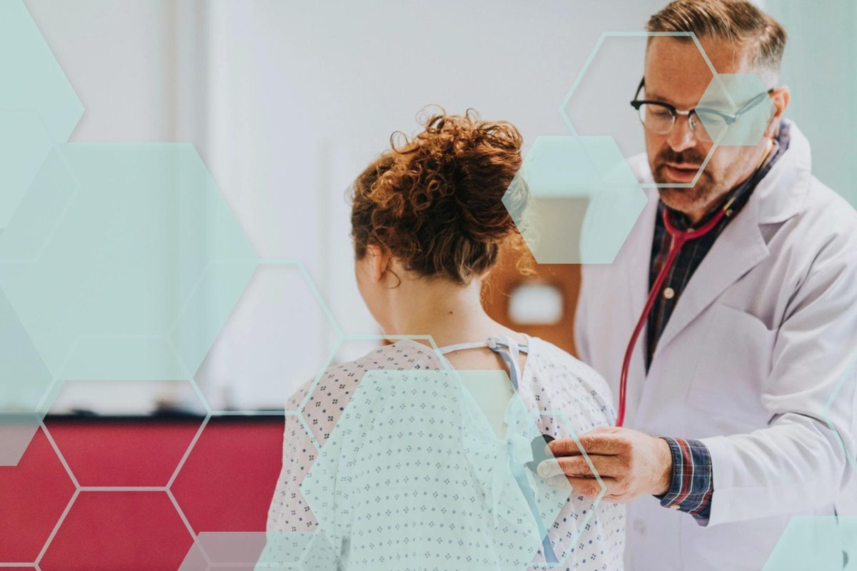 Doctor examining a patient during a wellness visit